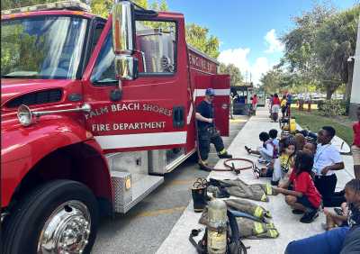 The Palm Beach Shores Fire Department gives a demonstrative presentation to students.